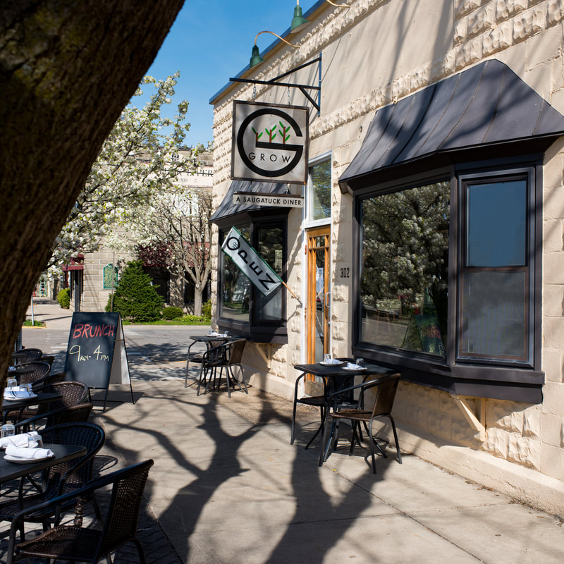 A downtown storefront and sidewalk